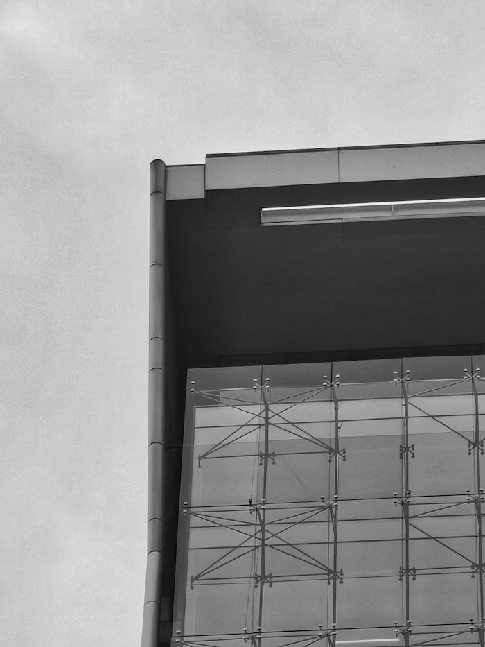Minimalistic black and white photo of modern architectural facade in Santiago, Chile.